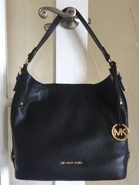 Michael Kors Black Leather Handbag with Gold 